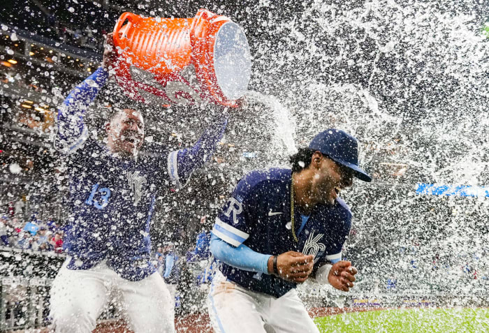 May 3, 2022; Kansas City, Missouri, USA; Kansas City Royals designated hitter MJ Melendez (1) is doused with water by Kansas City Royals catcher Salvador Perez (13) after defeating the St. Louis Cardinals at Kauffman Stadium. Mandatory Credit: Jay Biggerstaff-USA TODAY Sports